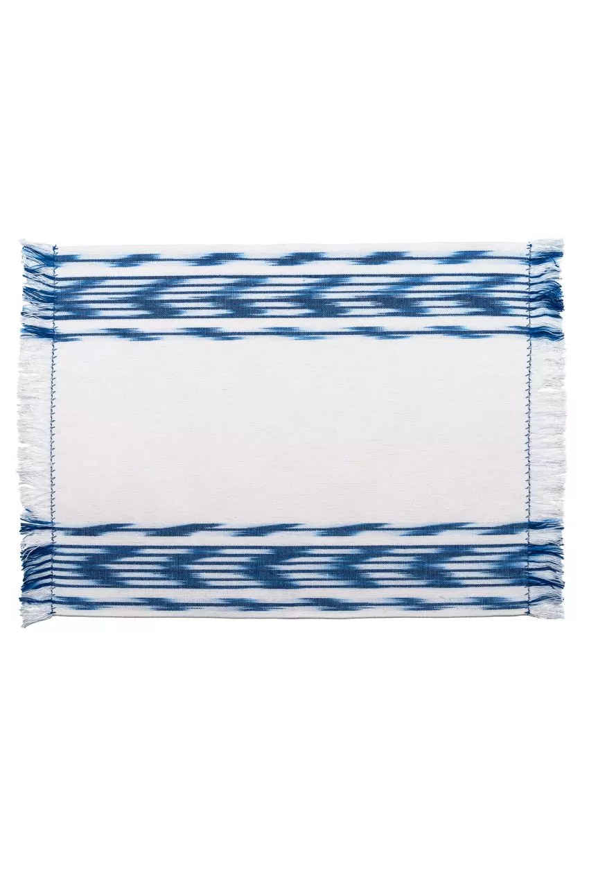 Individual textil modelo 235 en azul con flecos de Teixits Vicens